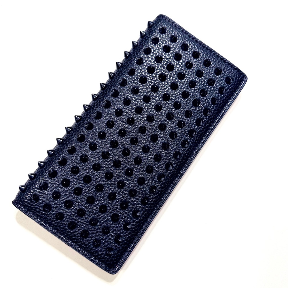 Louboutin Leather wallet with spikes dupe. Perfect condition.